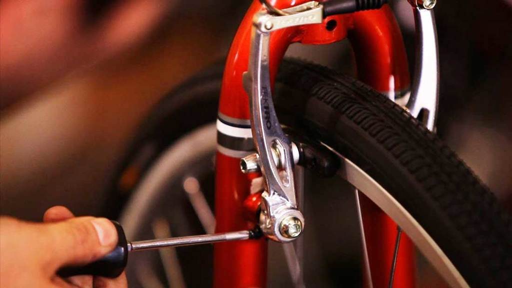 how to tighten up brakes on a bike