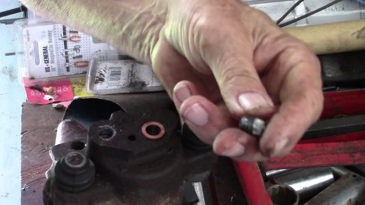 How to Get the Air Out of Brake Lines without Bleeding- remove screw