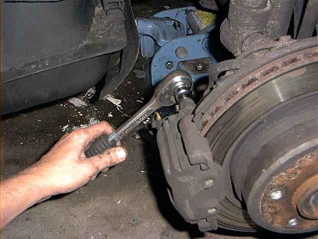  REMOVING THE CALIPER